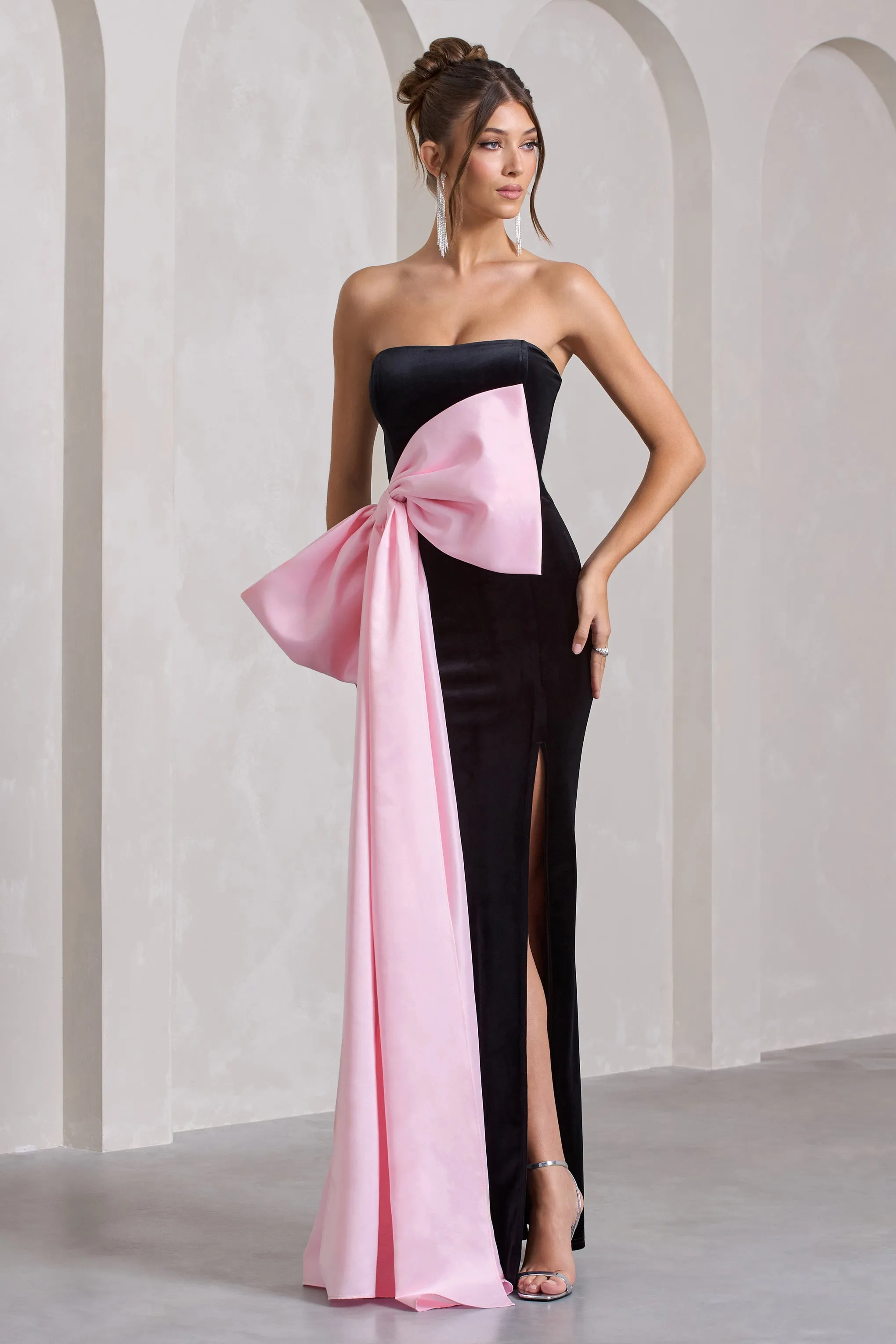 Best Wishes | Black Velvet Bandeau Split Maxi Dress With Oversized Pink Bow