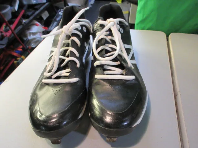 Used New Balance Metal Cleats Size 8