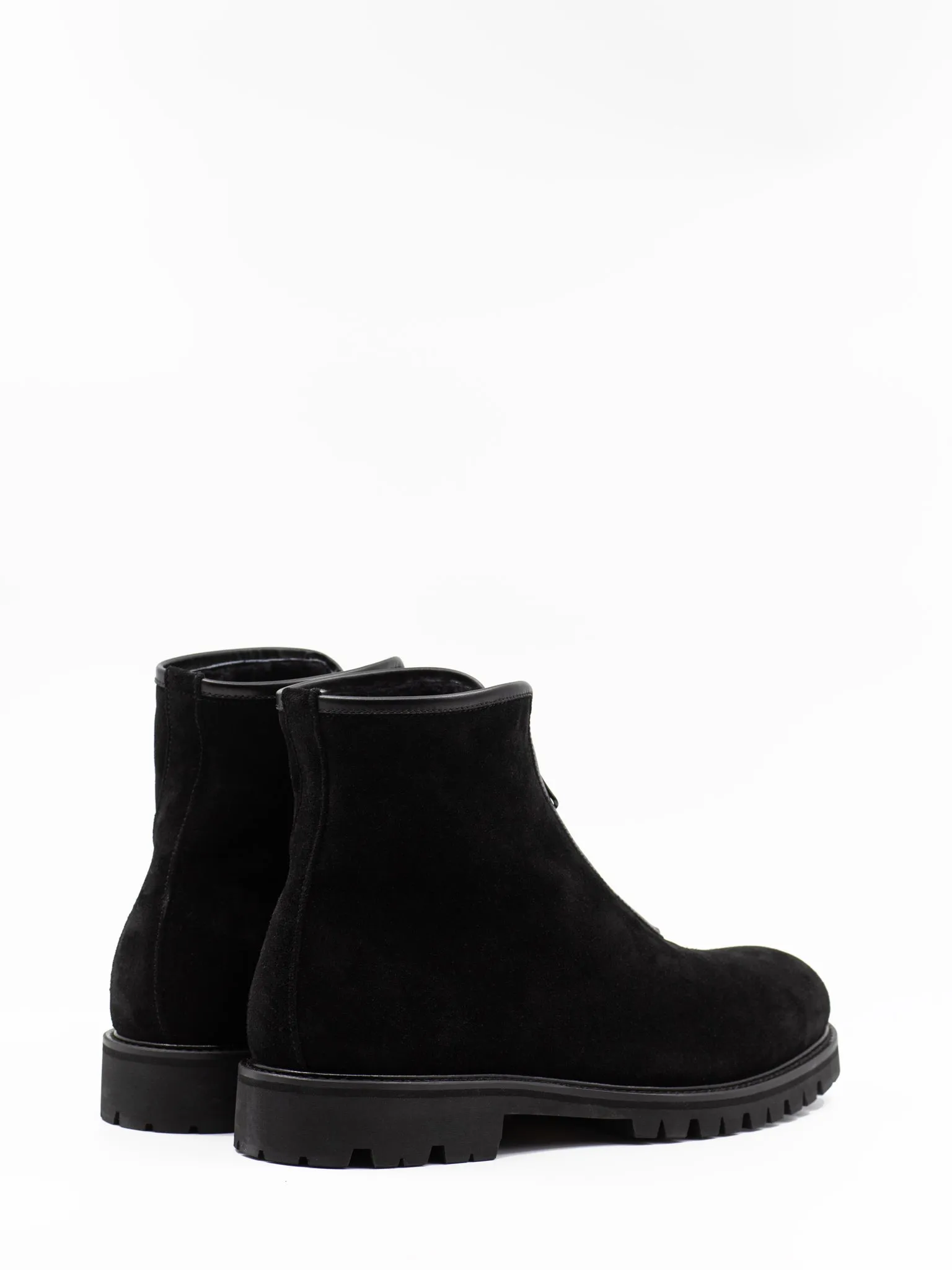 Zip-front shearling-lined black ankle boots